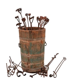Collection of Branding Irons in Wooden Barrel