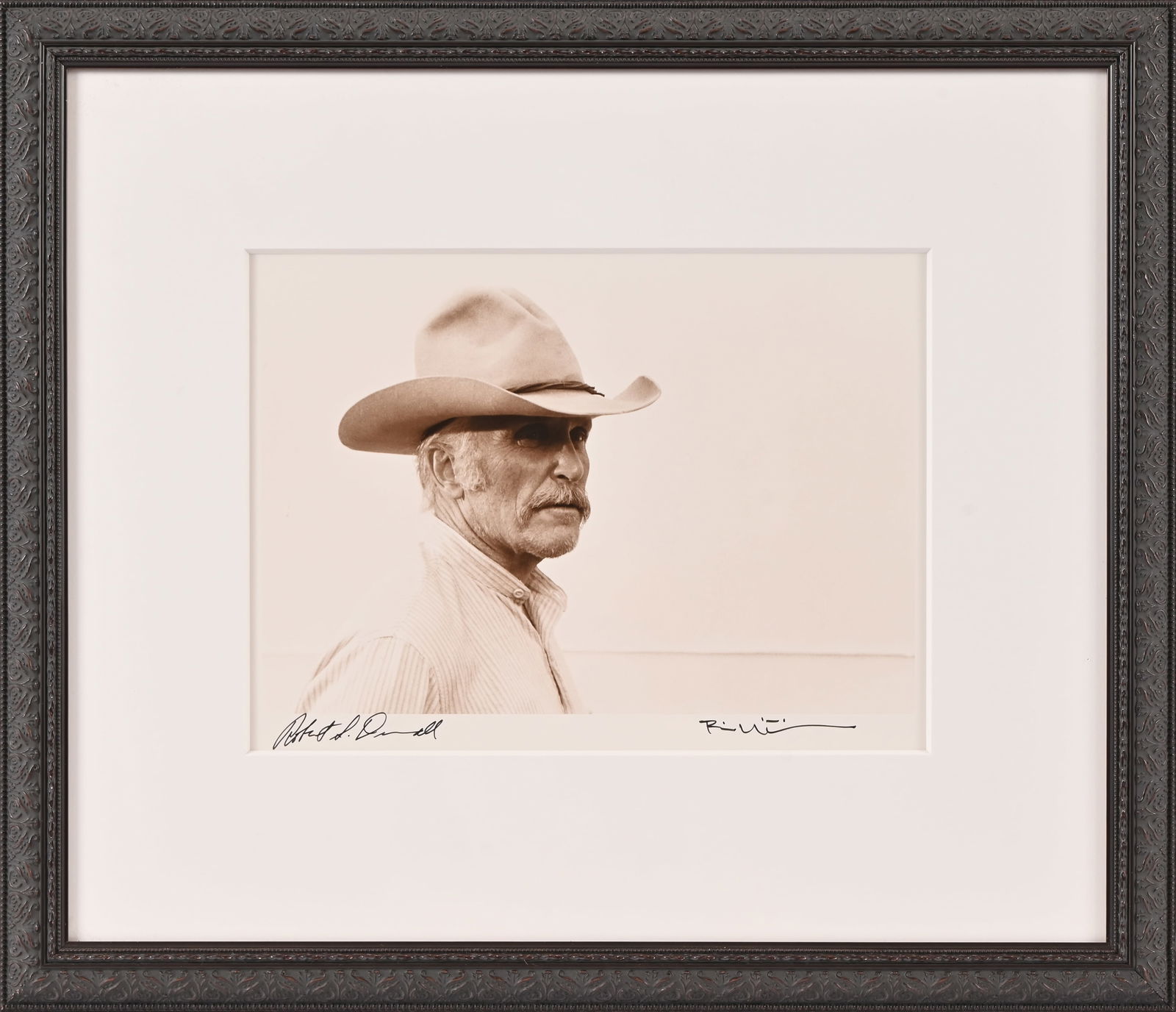 Lonesome Dove Double Signed Photo by Bill Wittliff: Captain Augustus McCrae", double-signed silver gelatin 16x20 Lonesome Dove print by Bill Wittliff. Signed lower left by Robert Duvall, and lower right by Wittliff. Includes signed letter from Bill Wit