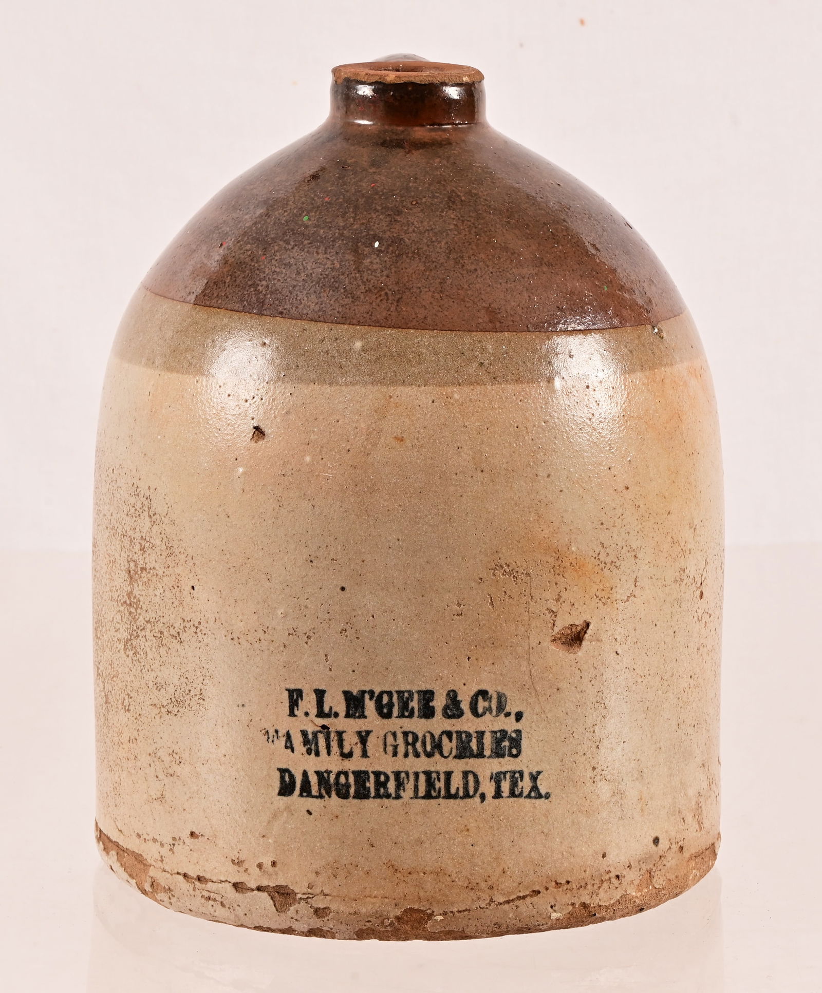 Dangerfield Texas F.L. M'Gee & Co. Saloon Jug: 12" H. Dangerfield, Texas.