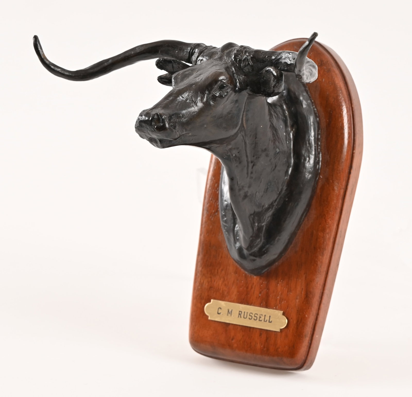 Charles M. Russell Small Longhorn Bronze: Recast by Powell Foundry. 6 1/2" x 6 1/2" x 5 1/2".