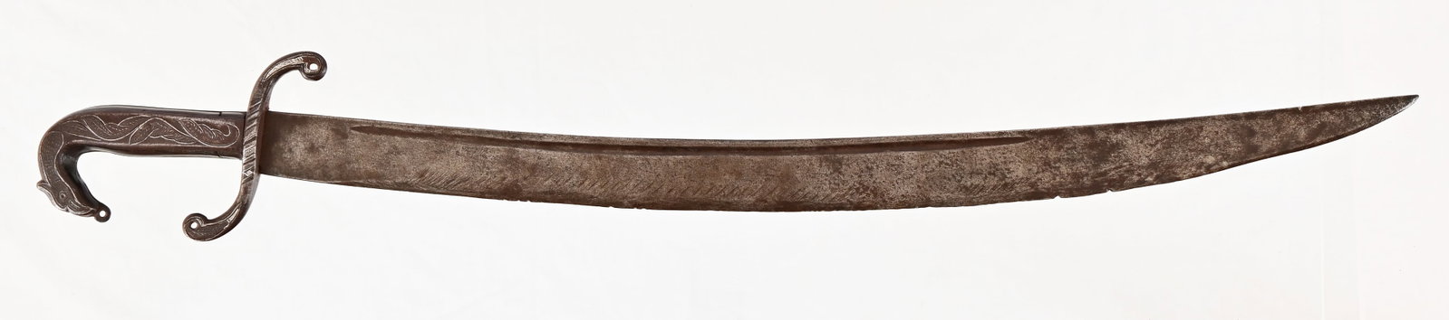 Spanish Colonial Espada Ancha Sword: Curved 28" blade, Silver inlay with floral design into dragon's head pommel, over reinforced horn handle. Overall length 33.5"