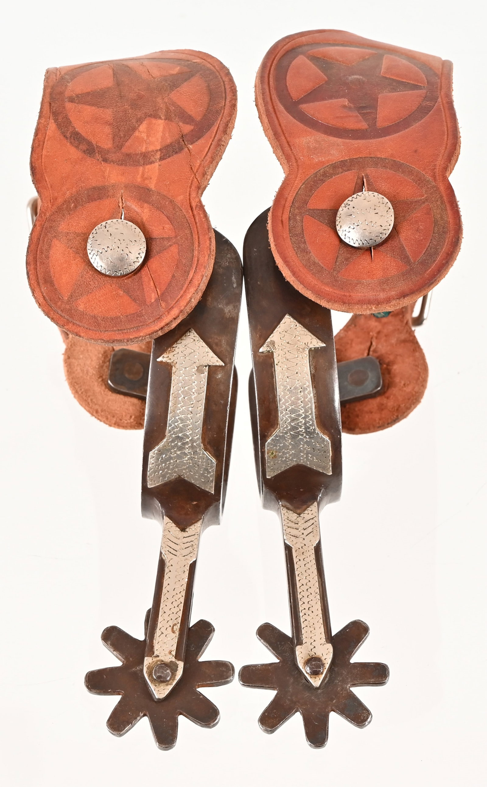 Rogers Marked Straight Arrow Pattern Spurs: Texas style spurs. Engraved silver inlay across straight arrow pattern shank and heel band.