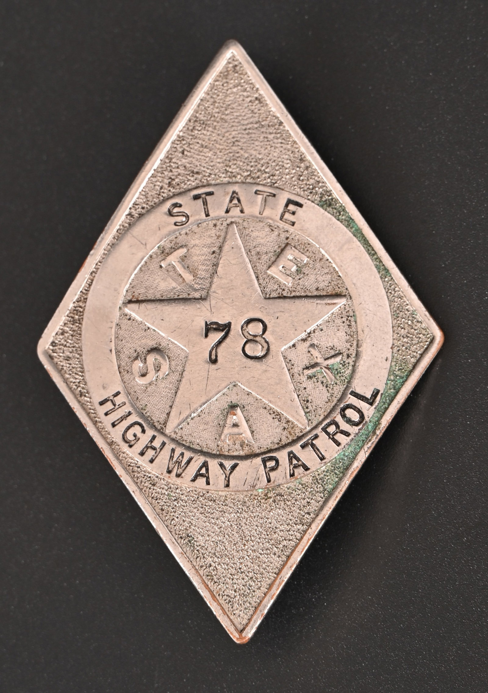 Texas State Highway Patrol Vintage Badge: Badge numbered "78". Measures 2x3