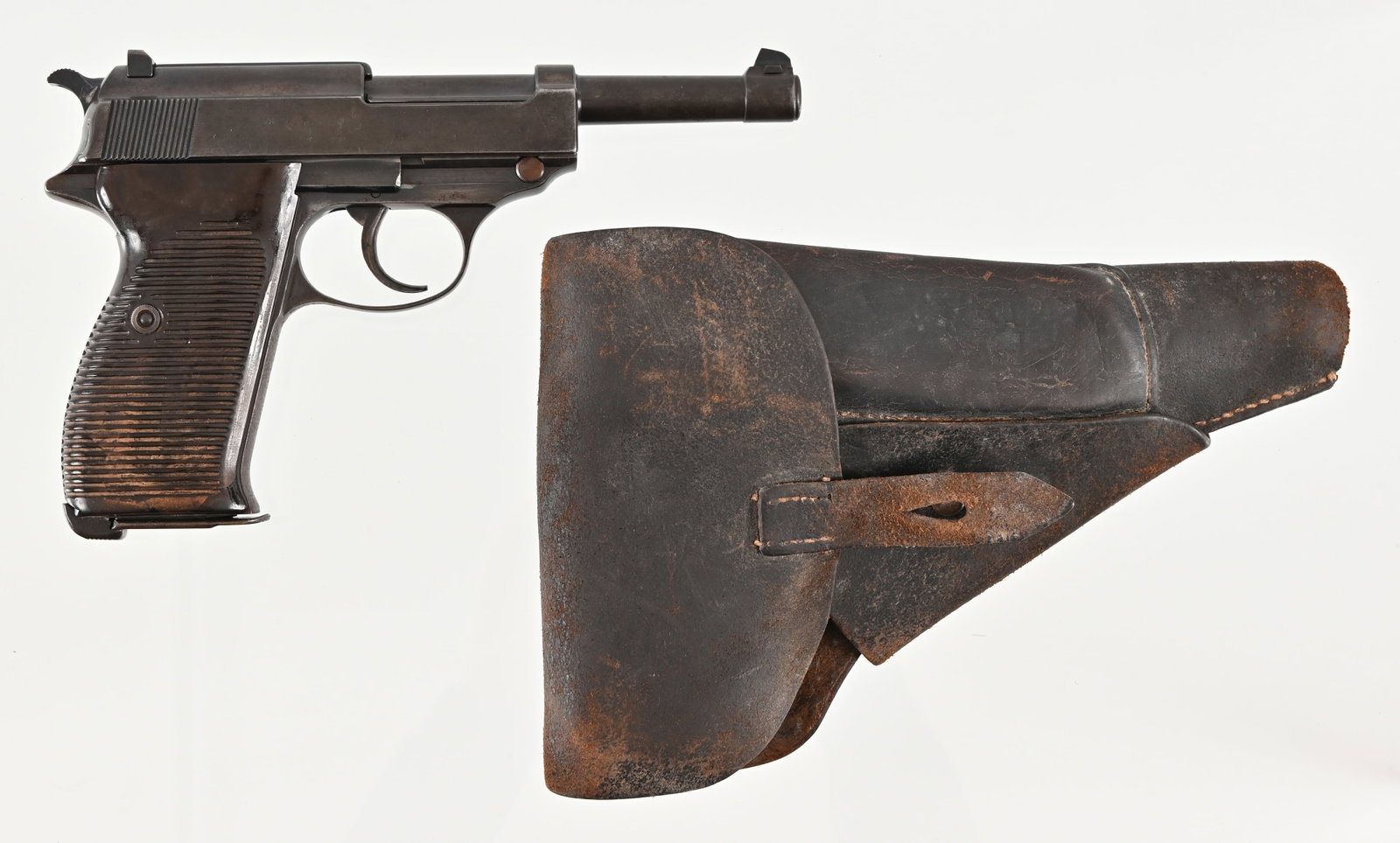 German Walther P38 9mm Pistol: SN 2849 d. Marked AC 41, German eagle stamps. 5" barrel, dark bore with rifling. Numbers on frame and locking block match. Slide is marked 7958 c. Action functions. Holster appears to be period correc