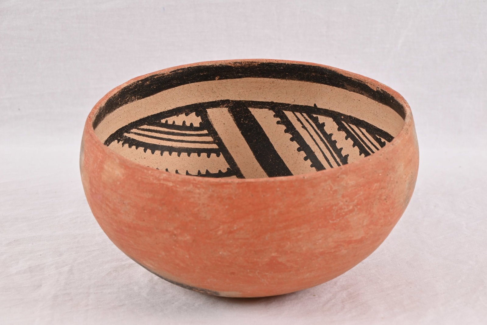 Ancient Anasazi Indian Polychrome Pottery Bowl: The Anasazi people inhabited the Four Corners region of the United States from about 100 AD-1300 AD. Measures approximately 4.25" x 8"