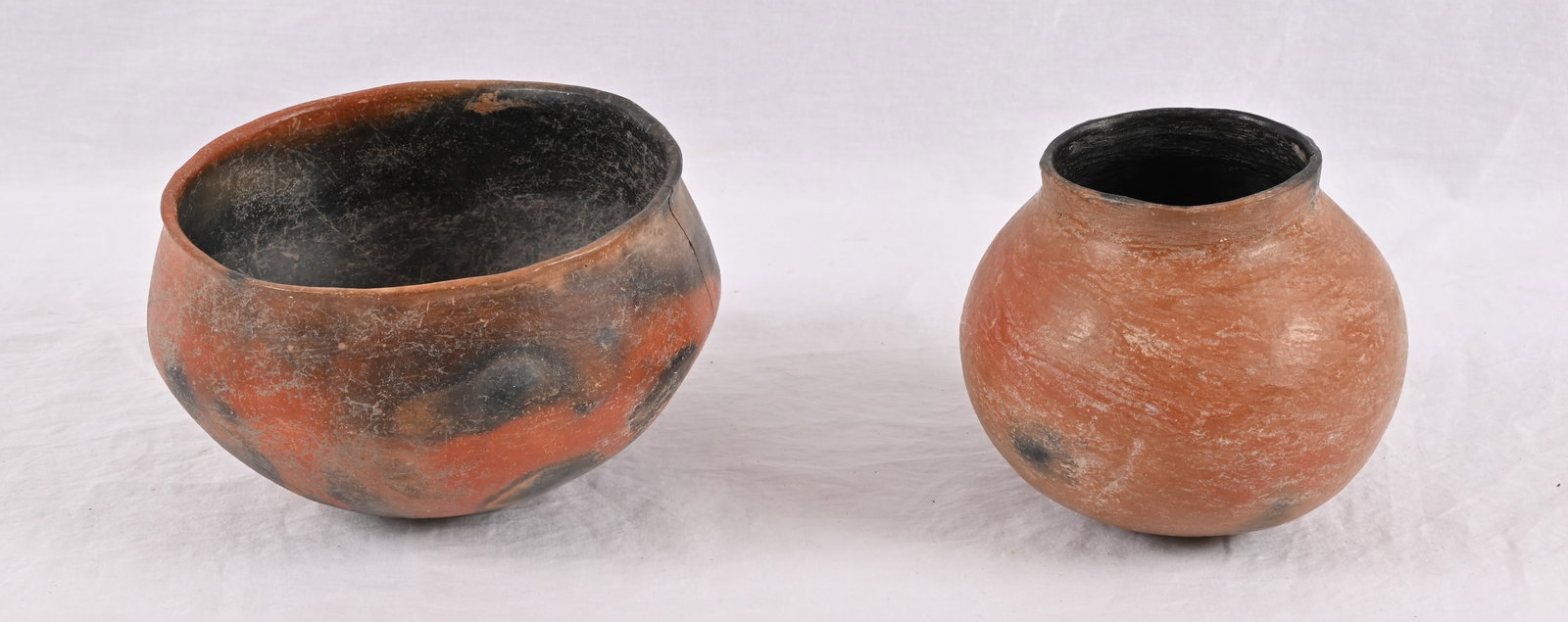 Ancient Anasazi Indian Pottery Bowl & Olla: The Anasazi people inhabited the Four Corners region of the United States from about 100 AD-1300 AD. Bowl measures 4.5" x 7.5", and does a small crack traversing 2" from the lip down the side. Olla me