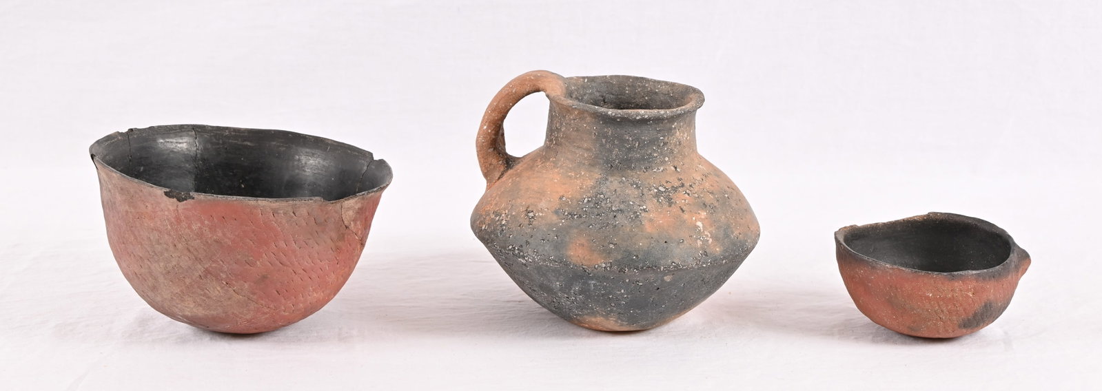 Ancient Anasazi Indian Pottery Collection (3): Three pieces include water olla/urn, bowl and scoop. Bowl measures approximately 4" x 6.25", with previous crack repair. Olla or water urn measures approximately 5.25" x 6.5"