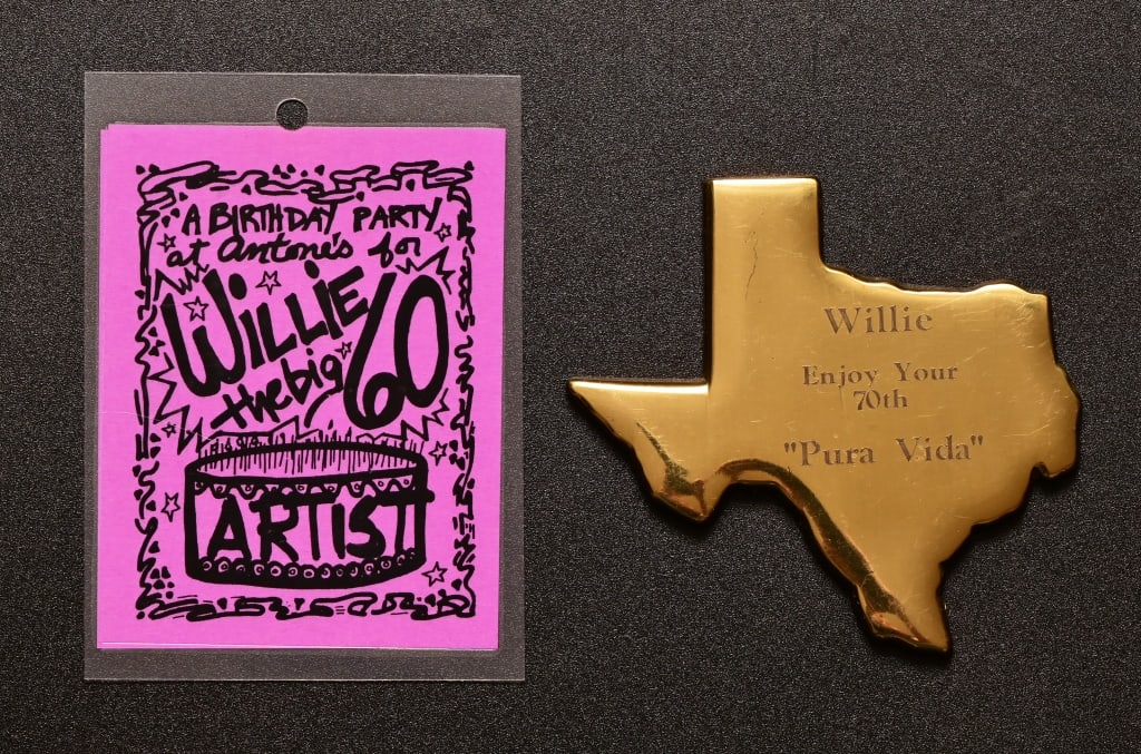 Willie Nelson's Birthday VIP Pass & Paperweight: From the personal collection of Paul English. Willie Nelson's personal VIP credentials for his 60th birthday celebration at Antone's in Austin, Texas. Also includes Paper weight dedicated to Willie, "