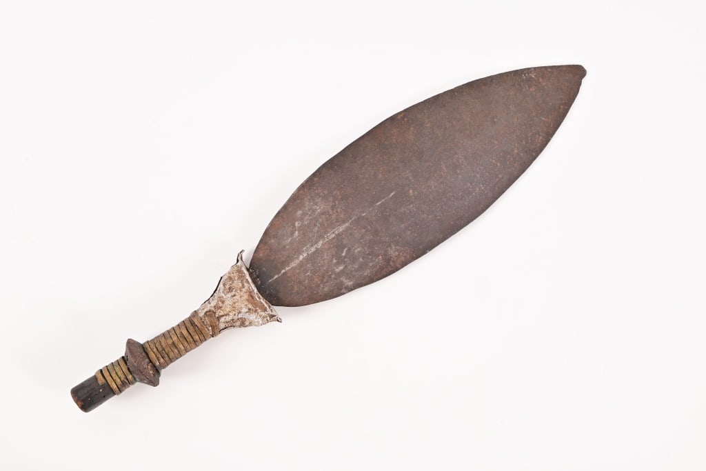 West African Tribal Currency Knife or Speerhead: Iron blade, 4.25" x 13", brass wrapped wood handle. Overall length 19.25".