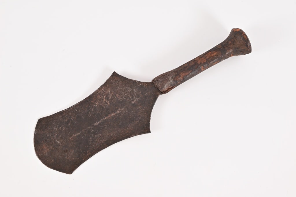 West African Tribal Currency Spade Knife: Blade measures 4.25" x 8", wood handle, overall length 14.5".