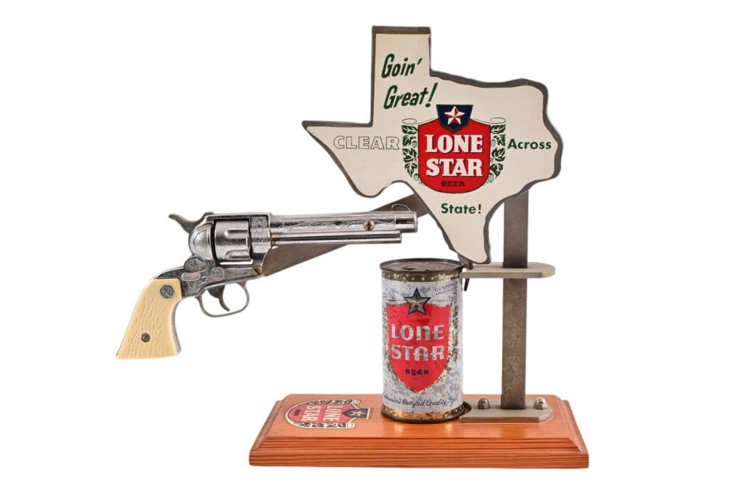 Lone Star Beer Revolver Flat Top Can Opener: Novelty Can Punch Co, Thrall Tx. Given to top selling Lone Star Distributors has the flat top Lone Star Can. 5.5" x 13"x15" . Can is 2 5/8 diameter x 4 3/4". In better condition than most we have seen