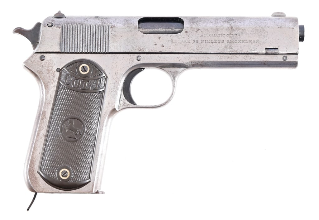 Colt Model 1902 Semi-Auto .38 ACP Pistol: S/N 29889, Manufactured in 1907. Barrel measures 4.5" , bore is gray with distinct rifling present. Bluing remaining on hammer, trigger and barrel. Action functions, magazine is blued and unmarked. Mo