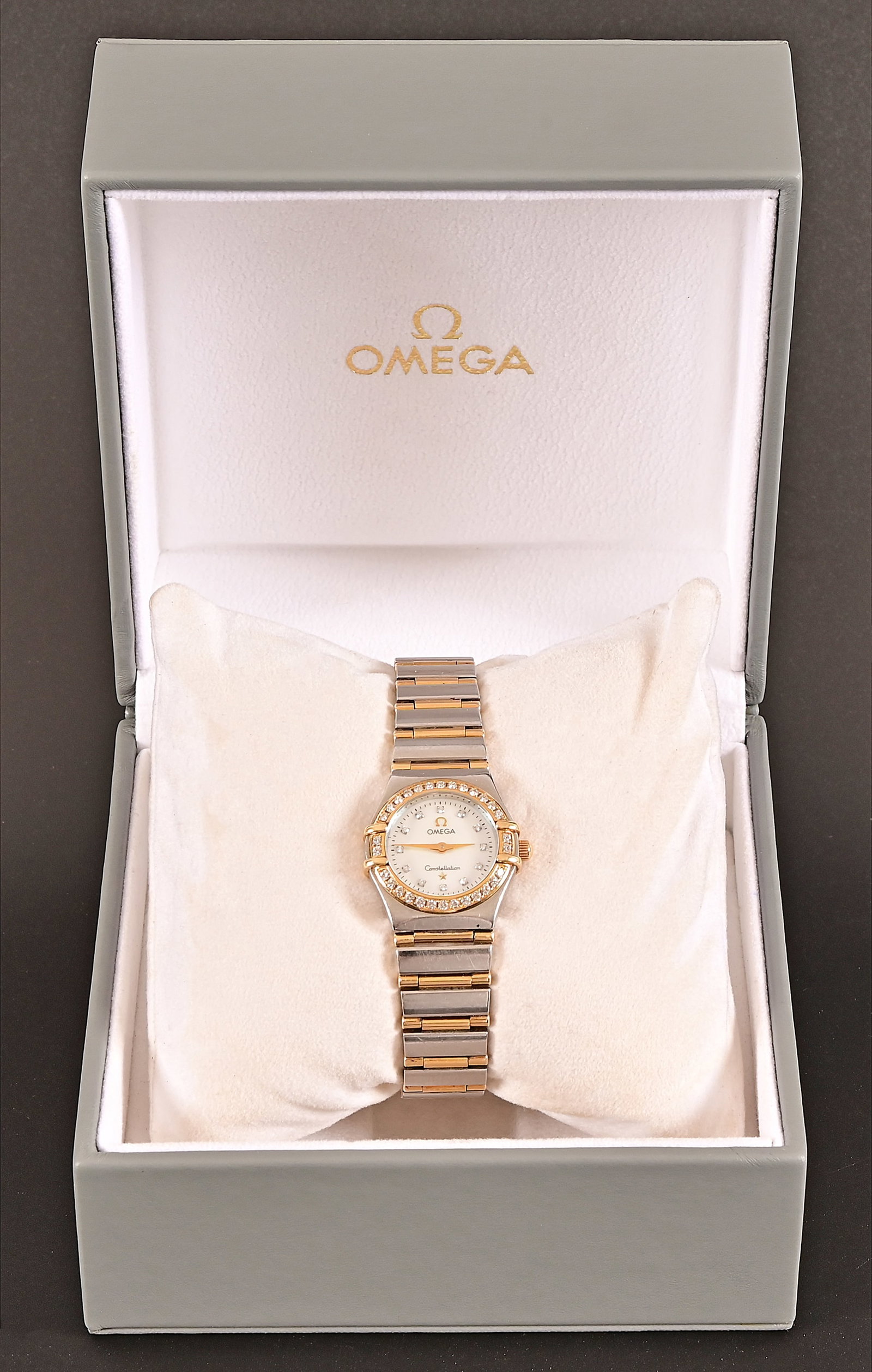 Omega Constellation Diamond Bezel Ladies' Watch: Stainless and Gold with Diamond bezel and numerals. In original box with paperwork.