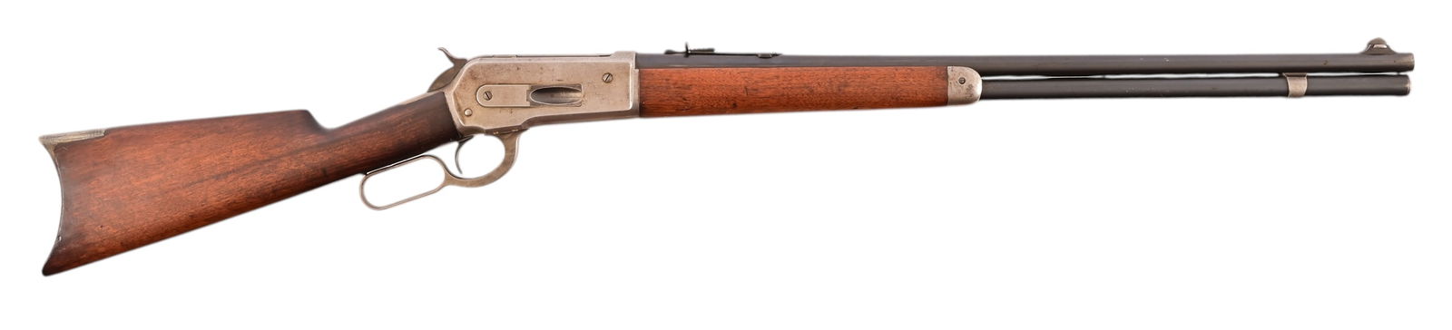 Winchester 1886 Lever Action Rifle .33WCF: S/N 149069, Manufactured in 1910. Barrel measures 24", bore is dark but with strong rifling. High degree of bluing remains on barrel and mag tube, receiver is gray patina. Working, tight action. .33 W