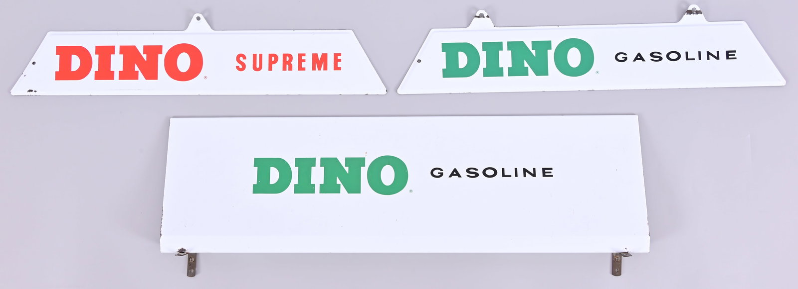 (3) Sinclair Dino Gasoline Porcelain Sign Panels: 3 plate/rack signs. 2 smaller signs measure 22" x 4". Larger measures 26 3/4" x 7 1/2".