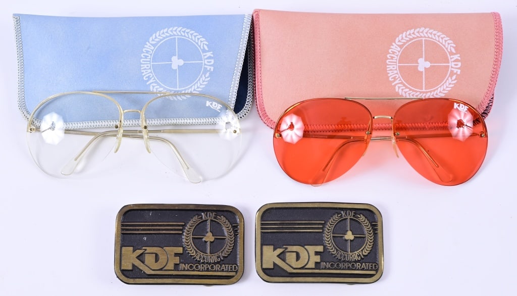 KDF Firearms Shooting Glasses & Belt Buckles: Two pair of vintage 1980's His/Hers vintage KDF Accuracy NOS shooting glasses and belt buckles.