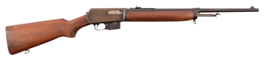 Winchester Model 1907 Semi-Auto Rifle .351 Cal: S/N 52620, Manufactured in 1957. Barrel measures 20", bore is frosted but with strong rifling. Wood is nice with no cracks. Receiver top has been drilled and tapped at some point. Modern