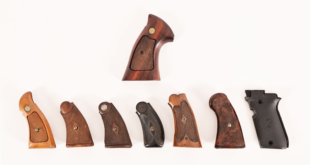 Collection S&W Revolver Checkered Wood Grips: Includes 6.5 sets of various model S&W checkered wood revolver grips; (One) Zenith pistol pair of grips.
