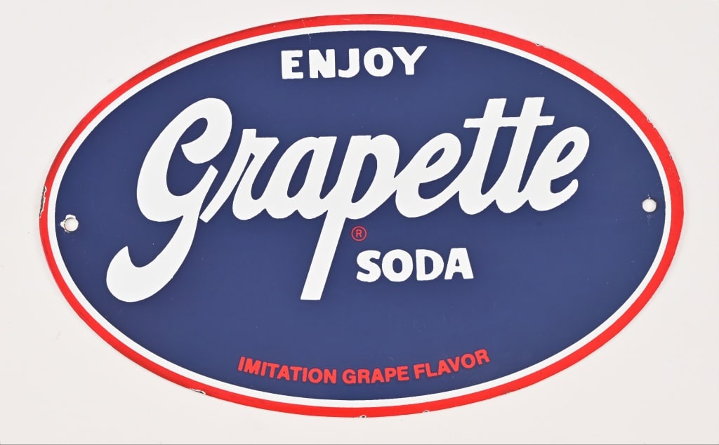 Enjoy Grapette Soda Porcelain Advertising Sign: Oval sign. Measures 11 3/4" x 7 1/2".