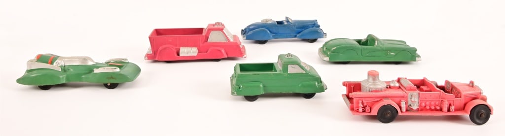 (6) Garrett Sales and Auburn Vintage Rubber Cars: Garrett' Sales include, Rocket Car, Corvette, 30's Convertible, Fire Truck and Utility Truck. Auburn is Fire Truck. Most are 7" - 8" in length, hard rubber construction.