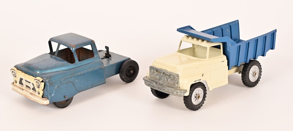 2 Vintage, Metal Toy Trucks: Marx, blue hauling truck, 10" long, 4.5" high. Hubley, blue and tan dump truck, 11" long, 5" high.