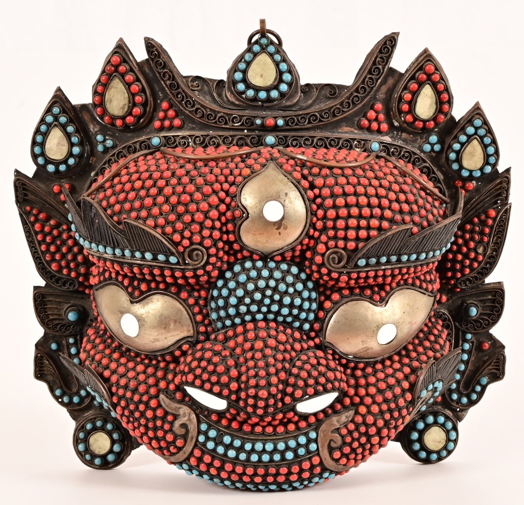 Vintage Tibetan Nepal Mahakala Mask: Hand forged brass mask, decorated with assorted glass bead, shell and bone. Measures 6" x 16" x 16"