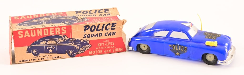 Vintage Saunders Tool & Die Friction Police Car: Vintage friction toy Police Squad car, manufactured by Saunders Tool & Die Co., Aurora Illinois.