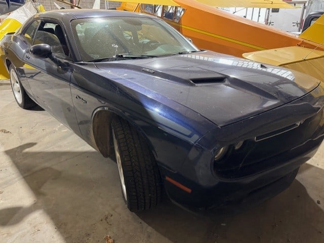 2016 Dodge Challenger RT: Not currently running. Needs basic maintenance to make driveable, Stored in the airplane hangar, Hemi V8. Has large gouge in passenger door, interior needs cleaned. keys, Title in Mike Arcuri's name.