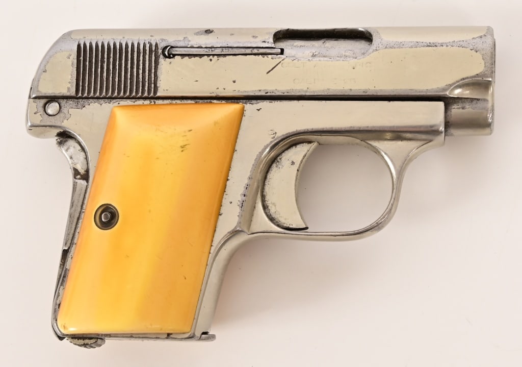 Colt M1908 Vest Pocket Pistol .25 ACP: SN 87119. Has been re-nickeled, 2" barrel, dark bore. Action works. Grips appear to be bone. Modern. .