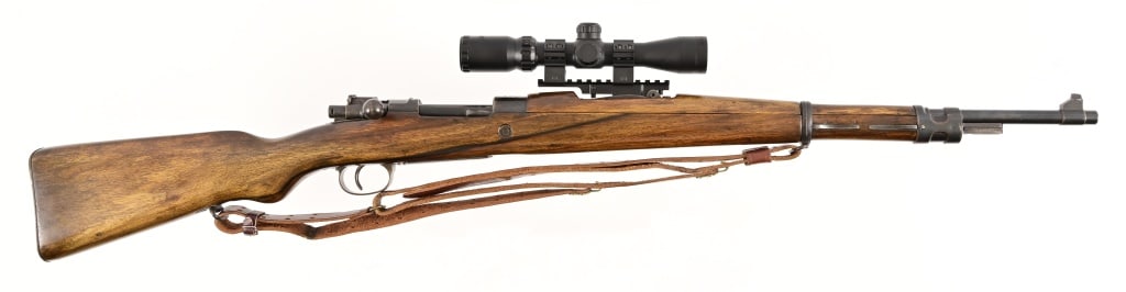 Yugoslavian/Serbian M48 Mauser: S/N 250883. 23.25" barrel, 8mm caliber. Forward mounted scope (scout style) has been added and sling. Good condition. Modern.