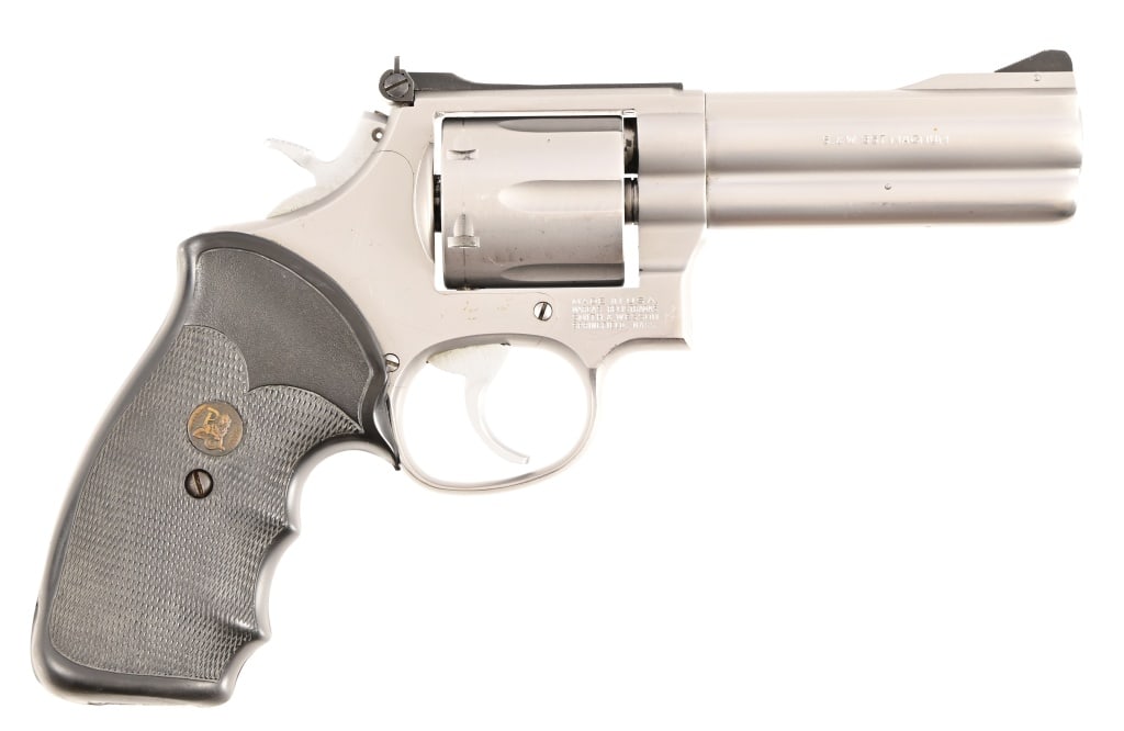 Smith & Wesson 686-1 Revolver .357 Magnum: S/N.BAN4186 Stainless finish, 4" barrel, checkered rubber Pachmayr grips. Modern