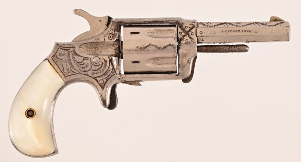 Hartford Arms Co. Spur-Trigger Revolver .32 Cal.: S/N 8142. Circa 1880's. Nickel plated with 2.5" octagonal barrel, lightly engraved with pearl grips. Hammer cocks but action does not lock up. Nice condition. Antique.