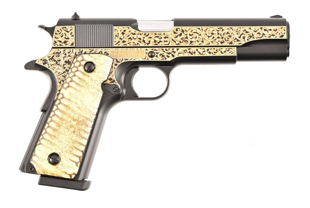 Tisas Engraved Custom 1911A1 Service .45 ACP: S/N T0620-24Z27035. Manufactured by Tisas, Knoxville Tennessee. Scroll engraving on slide and frame. Like new in original box. Modern