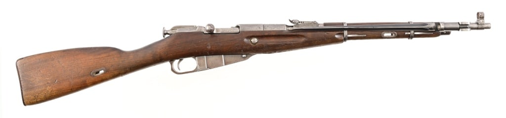 Chinese Type 53 Carbine Rifle: SN 1179968. Chinese copy of Russian Nagant M44 carbine. Dated 1954, 21" barrel, rough bore. No caliber markings but should be 7.62x54. Folding bayonet, some minor rust areas. Modern.