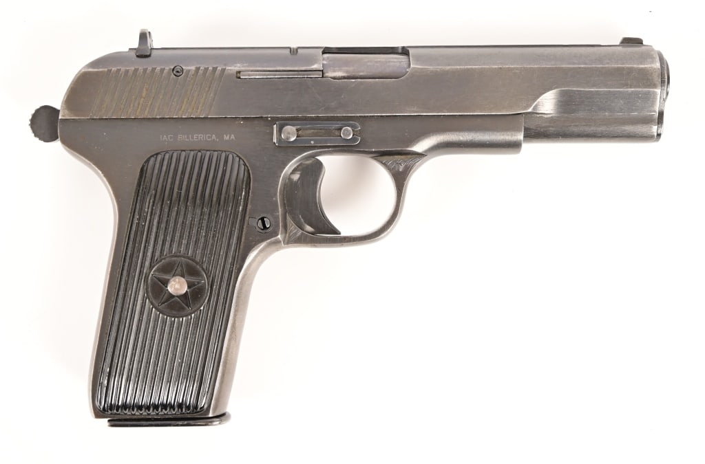 Chinese Norinco Model 213 Semi-Auto 9mm: S/n 704967. Tokarev type semi auto pistol. 4" barrel, working condition. Modern.