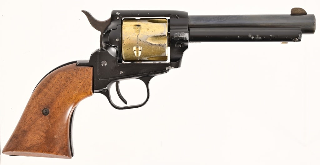 Western Duo .22LR Revolver: S/N F02023. 4.75" barrel. Imported by Firearms Import & Export Company, Miami Florida. Foreign made. Action works, fair condition. Modern.