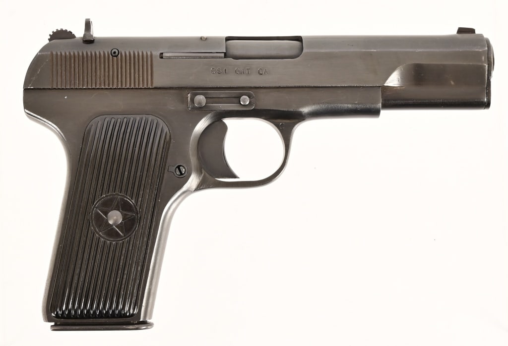 Norinco Model 54 Semi-Auto 7.62x25mm Pistol: S/N 207784. 4.5" barrel, good bore. Good condition, one magazine. Modern.