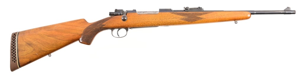 FN Venezuela Sporterized Mauser: SN 016956. 18" barrel, fair bore. Bore appears 7.65 caliber. Sporter stock, sling. Modern.