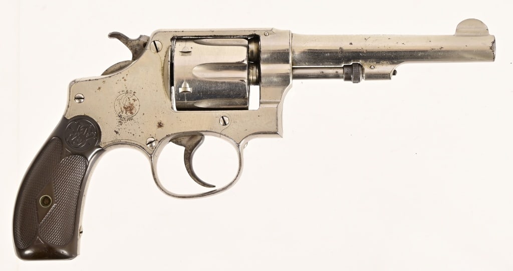 Smith & Wesson .32 Long Revolver: S/N 181909. Hand ejector model. 4" barrel, fair bore. Nickel finish intact to a large degree. Working action. Modern.