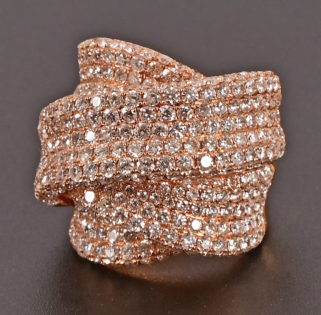 Ladies Diamond 18K Rose Gold Fashion Ring: With Appraisal: "One 18kt. rose gold diamond ring. The ring contains three hundred and thirty (330) round brilliant cut diamonds with an approximate total weight of 6.60 cts. The diamonds have an appr