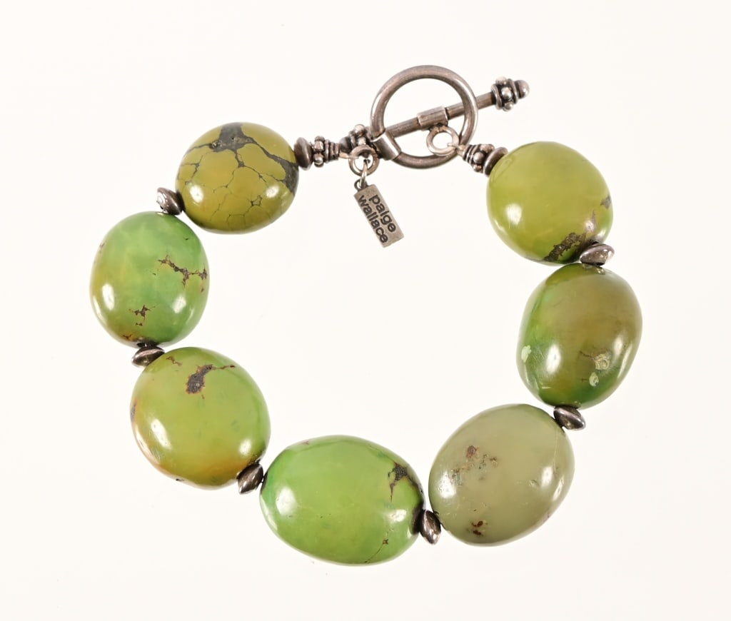 Paige Wallace Designs Sterling Turquoise Bracelet: Measures 9" total length, contains seven turquoise stones.