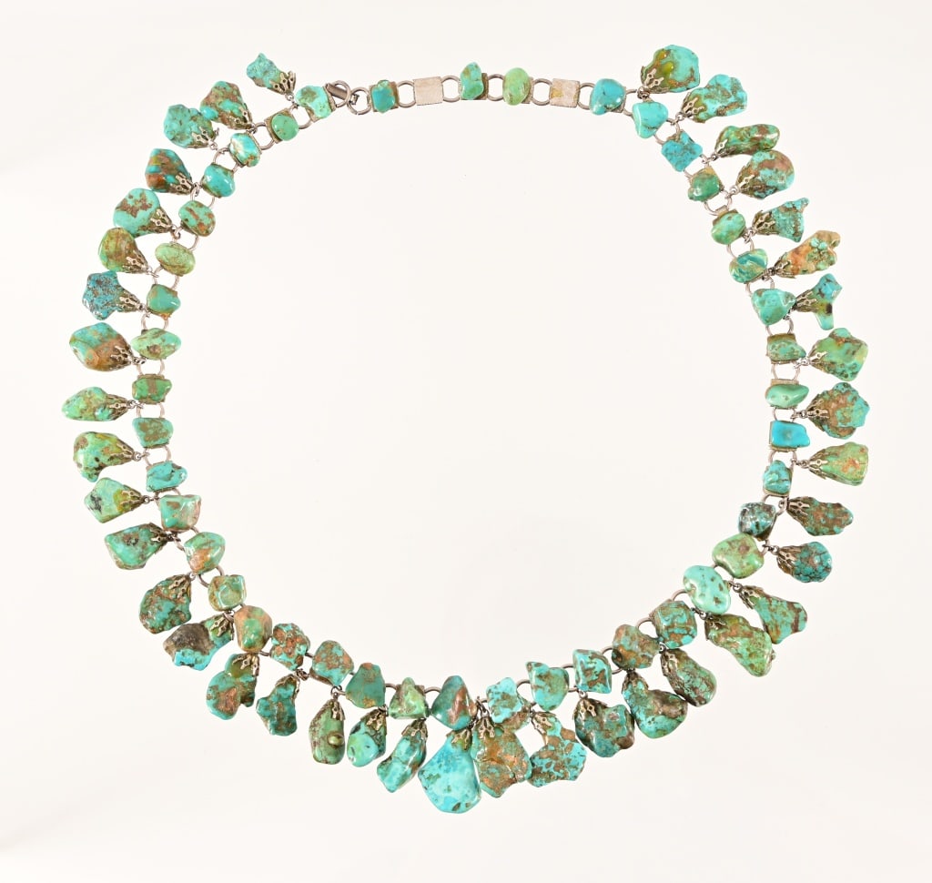 Turquoise Stone Silver Necklace: Contains (81) turquoise stones. Measures 28" in length