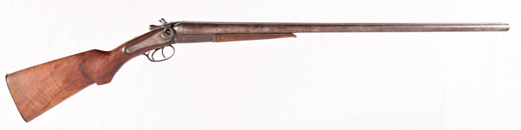 Belgium Hammered 12 GA Shotgun: SN 6270. Double 28" barrels marked laminated steel. Dark bores. Hammers work, action is slightly loose. Wood has scuffs and dings but no cracks. Antique.