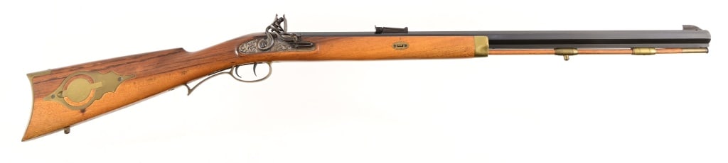 The Hawken .50 Flintlock Rifle: Serial 042084. Black powder only, made in Italy. 28" barrel.
