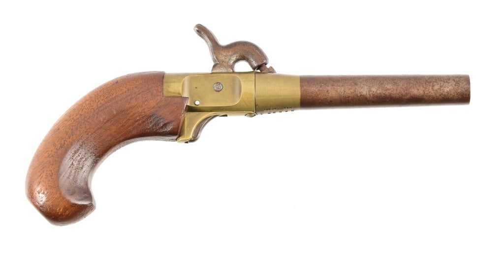 CMC Single Shot Black Powder Pistol: S/N 989964. 3 1/2" barrel. Percussion derringer, brass frame. Black Powder.