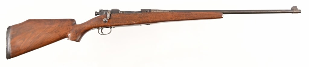 Springfield 1903 Sporterized .30: SN 1154045. 24" barrel, bore is dark with some rifling present. Receiver has cut for Peterson WWI devise which is rare.