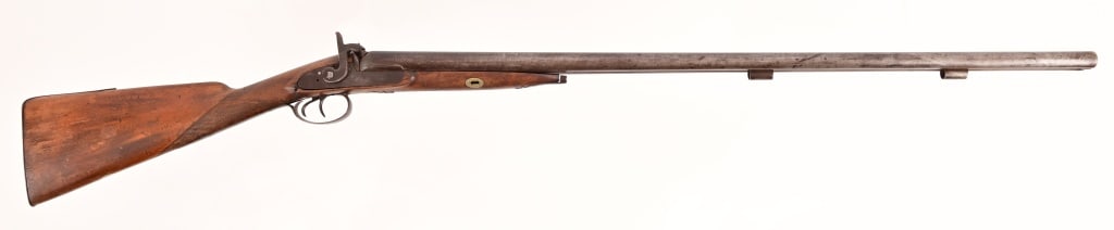 Antique Percussion Double Barrel Shotgun: No maker's mark. 34" barrels, marked "fine London twist". Left hammer is missing, right hammer works. Stock is cracked at rear of right lock. Antique.