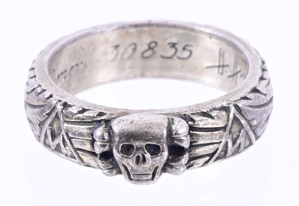 WW2 German Nazi SS Officer Silver "Ehrenring": Heinrich Himmler personally gifted "Ehrenring" or "Totenkopfrings" (Death's Head Ring) to SS Officers. Sterling Silver, engraved and numbered inside band with Himmler's signature.