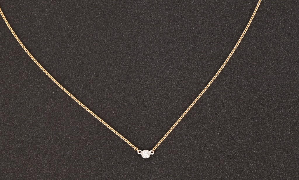 Tiffany & Co. Diamond 18K Gold Necklace: Singular diaond, 18K gold 15.5" chain