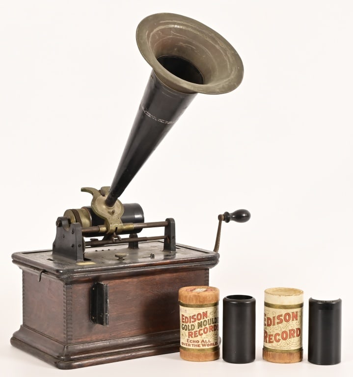 Antique Edison Wax Cylinder Record Phonograph: Includes three wax cylinders, (one broken was used for display). Does need some work with the belt, in order to operate.